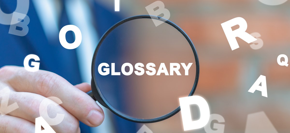 Magnifying glass highlighting Glossary